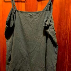 Blue tank top with adjustable straps.